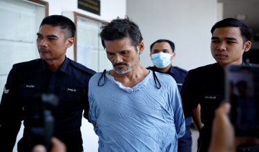Tertuduh, Saiful Hadi Othman, 44 tahun dihadapkan ke Mahkamah Majistret Ayer Keroh hari ini atas pertuduhan membunuh rakannya di Sungai Udang, Melaka minggu lepas./BERNAMA