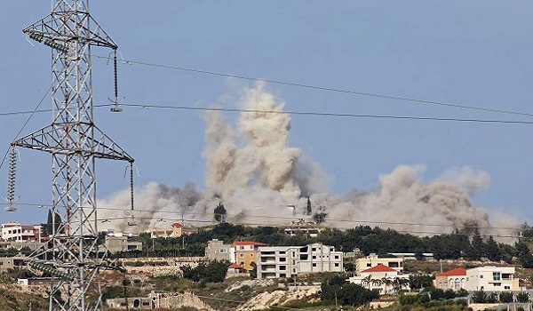 Smoke rises from the site of an Israeli airstrike that targeted the southern Lebanese village of Erzay on May 17, 2026. Israel launched a massive series of airstrikes on southern Lebanon on May 17, despite an extension of the truce between the two countries. Israel says it is targeting Hezbollah but the strikes were preceded by an evacuation warning covering nine villages. And the continuing bombardment has only increased scepticism about the truce among the many thousands of Lebanese driven from their homes in the south. (Photo by Kawnat HAJU / AFP) / The erroneous mention[s] appearing in the metadata of this photo by Kawnat HAJU has been modified in AFP systems in the following manner: [Erzay] instead of [Tourzai]. Please immediately remove the erroneous mention[s] from all your online services and delete it (them) from your servers. If you have been authorized by AFP to distribute it (them) to third parties, please ensure that the same actions are carried out by them. Failure to promptly comply with these instructions will entail liability on your part for any continued or post notification usage. Therefore we thank you very much for all your attention and prompt action. We are sorry for the inconvenience this notification may cause and remain at your disposal for any further information you may require.