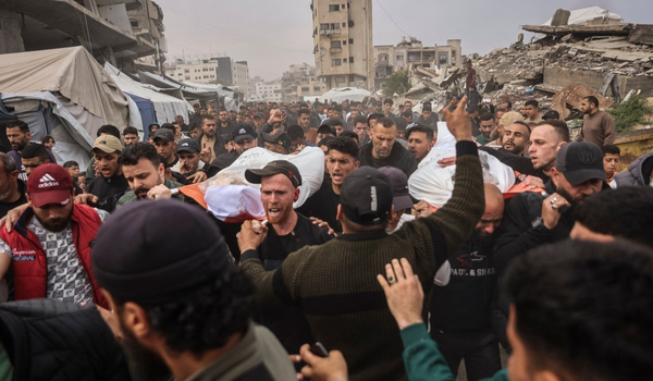 Mayat rakyat Palestin yang dilaporkan terbunuh dalam serangan Israel ke atas kem pelarian Al-Shati/ AFP
