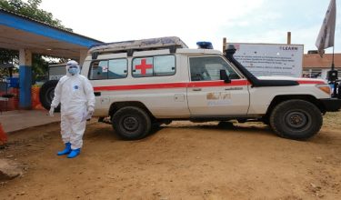 FILE PHOTO: A doctor wearing personal protective equipment (PPE) stands near an ambulance at the Ebola Virus Disease Treatment Center at the Bunia General Reference Hospital, one month after cases were confirmed in Bunia, eastern Democratic Republic of Congo, June 15, 2026. REUTERS/Gradel Muyisa Mumbere/File Photo