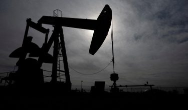 FILE PHOTO: A pump jack operates near a crude oil reserve in the Permian Basin oil field near Midland, Texas, U.S. February 18, 2025.  REUTERS/Eli Hartman/File Photo