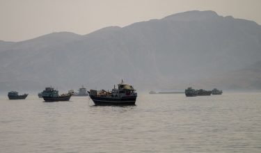 Vessels are anchored in the Strait of Hormuz, as seen from Musandam, Oman, June 19, 2026. REUTERS/Stringer