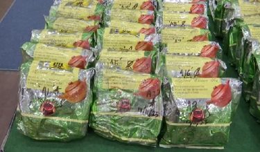 bungkusan plastik warna hijau berlabel teh cina berisi bahan disyaki dadah