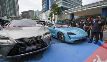 Antara kenderaan mewah yang disita dalam Op Empis - Foto BERNAMA