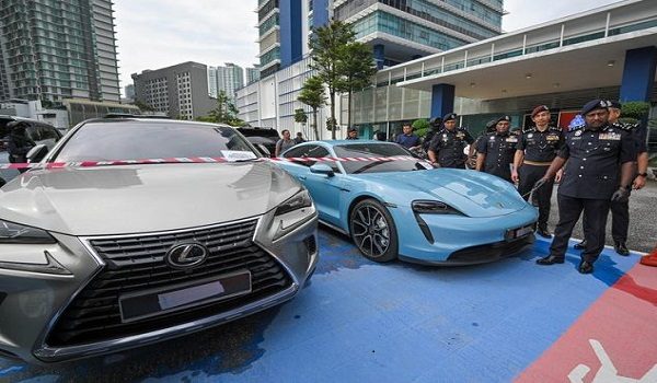 Antara kenderaan mewah yang disita dalam Op Empis - Foto BERNAMA