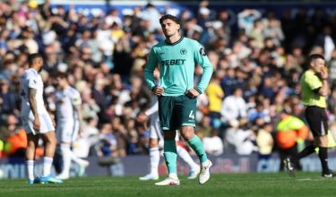 Wolverhampton Wanderers' Uruguayan defender #04 Santiago Bueno reacts to their defeat on the pitch after the English Premier League football match between Leeds United and Wolverhampton Wanderers at Elland Road in Leeds, northern England on April 18, 2026. Leeds won the game 3-0. (Photo by Darren Staples / AFP) / RESTRICTED TO EDITORIAL USE. No use with unauthorized audio, video, data, fixture lists, club/league logos or 'live' services. Online in-match use limited to 120 images. An additional 40 images may be used in extra time. No video emulation. Social media in-match use limited to 120 images. An additional 40 images may be used in extra time. No use in betting publications, games or single club/league/player publications. /