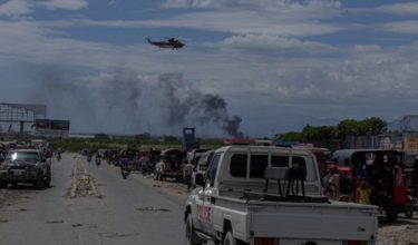 PORT-AU-PRINCE, HAITI - MAY 11: A helicopter prepares to land at Toussaint Louverture Airport following the armed attacks in the Plaine du Cul-de-Sac area of Port-au-Prince, Haiti on May 11, 2026. Armed clashes that began on the evening of Sunday, May 10, have triggered a new wave of panic, forcing several residents to escape the violence between rival gangs. Numerous homes have been struck by stray bullets (locally known as 'bal mawon'), further heightening the sense of insecurity in the region. Displaced families are leaving in small groups, often with no specific destination, seeking a safer location as tensions and armed violence continue in the capital. Guerinault Louis / AnadoluNo Use USA No use UK No use Canada No use France No use Japan No use Italy No use Australia No use Spain No use Belgium No use Korea No use South Africa No use Hong Kong No use New Zealand No use Turkey
