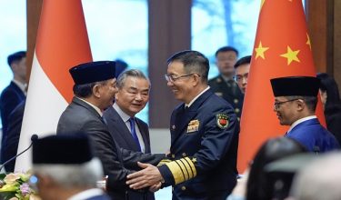 Indonesian Defense Minister Sjafrie Sjamsoeddin (L) shakes hands with Chinese Defense Minister Dong Jun (3rd L) as Chinese Foreign Minister Wang Yi(2nd L) and Indonesian Foreign Minister Sugiono(R) look on after a press briefing following the first meeting of the China-Indonesia joint foreign and defence ministerial dialogue at the Diaoyutai State Guest House in Beijing on April 21, 2025. (Photo by IORI SAGISAWA / POOL / AFP)