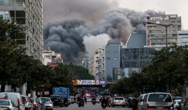 FILE PHOTO: Smoke rises after an Israeli strike in central Beirut's Bachoura neighbourhood, following an escalation between Hezbollah and Israel, amid the U.S.-Israeli conflict with Iran, in Beirut, Lebanon, March 12, 2026. REUTERS/Claudia Greco/File Photo
