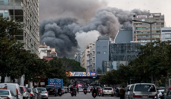 FILE PHOTO: Smoke rises after an Israeli strike in central Beirut's Bachoura neighbourhood, following an escalation between Hezbollah and Israel, amid the U.S.-Israeli conflict with Iran, in Beirut, Lebanon, March 12, 2026. REUTERS/Claudia Greco/File Photo