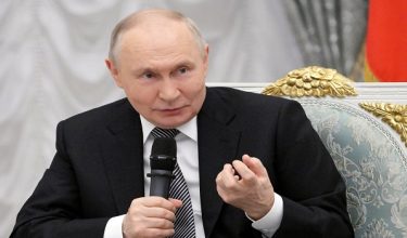 Russia's President Vladimir Putin attends a meeting with graduates of the "Time of Heroes" educational program established for Russian service personnel involved in the country's military campaign in Ukraine for their future employment in the state administration system, in Moscow, Russia, May 22, 2026. Sputnik/Alexei Nikolsky/Pool via REUTERS ATTENTION EDITORS - THIS IMAGE WAS PROVIDED BY A THIRD PARTY.