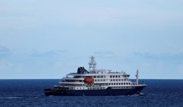 FILE PHOTO: The cruise ship MV Hondius, affected by a hantavirus outbreak, leaves the port of Granadilla de Abona, in Tenerife, Spain, May 11, 2026. REUTERS/Hannah McKay/File Photo