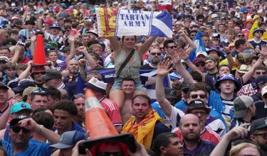 Soccer Football - FIFA World Cup 2026 - Scotland's Tartan Army march to LoanDepot Park - LoanDepot Park, Miami, Florida, U.S. - June 22, 2026 Scotland fans outside LoanDepot Park after marching to the stadium for the Miami Marlins Major League Baseball game against Texas Rangers IMAGN IMAGES via Reuters/Jim Rassol