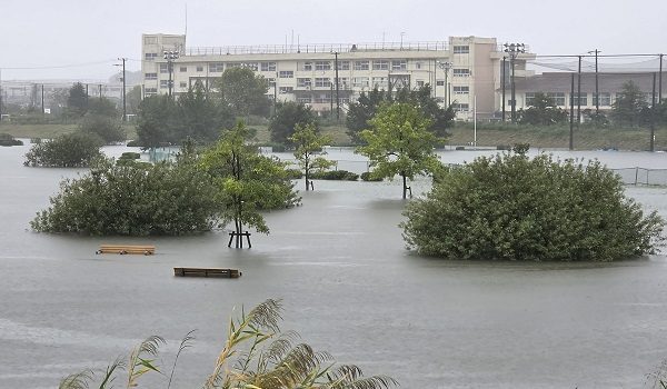 Flooding inundates a park as heavy rain falls amid weather patterns due to Typhoon Dujuan in Ichikawa city, Chiba Prefecture on September 21, 2026. Typhoon Dujuan forced the cancellation of at least 275 flights in Japan on September 21 and prompted warnings of potentially record-breaking rainfall as the storm nears Tokyo. (Photo by JIJI Press / AFP) / Japan OUT