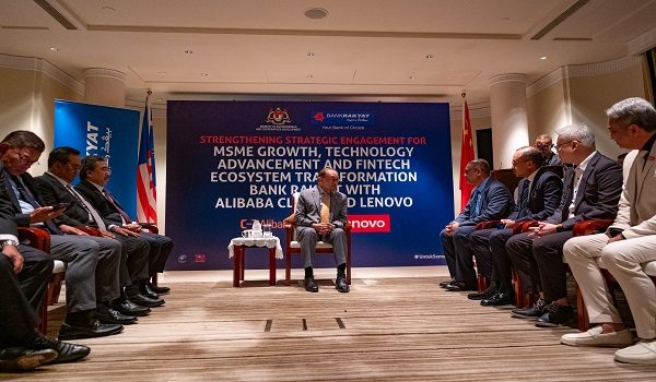 YAB Perdana Menteri, Dato' Seri Anwar Ibrahim menyaksikan pertukaran memorandum persefahaman antara Bank Rakyat dan Alibaba Group bersama Lenove semasa program Bank Rakyat Bizmatch di Shanghai, China. 22 September 2026. AFIQ HAMBALI/Pejabat Perdana Menteri.

NO SALES; NO ARCHIVE; RESTRICTED TO EDITORIAL USE ONLY. NOTE TO EDITORS: These handout photographs are provided solely for editorial reporting purposes and may be used only for the contemporaneous illustration of the events, subjects, individuals depicted, or facts referenced in the accompanying caption. Any further reuse may require additional permission. The photographs may not be archived, stored, retained, or otherwise kept for future use beyond the permitted contemporaneous editorial use. Any subsequent use, reproduction, publication, distribution, or archival retention requires prior permission. MANDATORY CREDIT - Afiq Hambali/ Prime Minister’s Office of Malaysia.