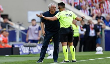 Referee Miguel Angel Ortiz Arias speaks to Real Madrid's Portuguese coach Jose Mourinho during the Spanish league football match between Club Atletico de Madrid and Real Madrid CF at the Metropolitano stadium in Madrid on September 20, 2026. (Photo by Oscar DEL POZO / AFP)