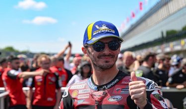 Third placed Team Ducati Lenovo Team's Francesco Bagnaia shows the thumb up after the MotoGP Grand Prix of Czechia in Brno, Czech Republic, on June 21, 2026. (Photo by Michal Cizek / AFP)