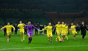 Bodo/Glimt's Nplayers celebrate their win at the end of the UEFA Champions League second-leg play-off football match between Inter Milan and Bodo/Glimt at San Siro stadium in Milan, northern Italy, on February 24, 2026. (Photo by PIERO CRUCIATTI / AFP)