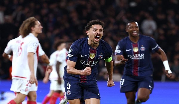 Paris Saint-Germain's Brazilian defender #05 Marquinhos celebrates after scoring Paris Saint-Germain's first goal during the UEFA Champions League play-off second leg football match between Paris Saint-Germain (PSG) and AS Monaco at the Parc des Princes stadium in Paris on February 25, 2026. (Photo by FRANCK FIFE / AFP)
