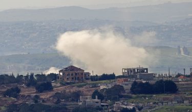 Smoke rises over the southern Lebanese village of Taybeh near the border as seen from the Upper Galilee in northern Israel, on April 25, 2026. Lebanon's health ministry said Israeli strikes on April 25 in the country's south killed four people, despite a ceasefire that was extended this week in the war between Israel and militant group Hezbollah. (Photo by Jalaa MAREY / AFP)