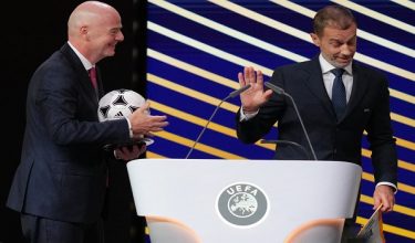 (FILES) FIFA President Gianni Infantino (L) speaks with UEFA president Aleksander Ceferin after addressing the 50th UEFA Ordinary Congress in Brussels on February 12, 2026. UEFA chief Aleksander Ceferin has ruled himself out of the running to replace Gianni Infantino, the under-fire FIFA president on August 24, 2026. Infantino has come under increasing pressure to step down over his now abandoned plan to secure private investment in FIFA tournaments, with Ceferin one of the leading figures in the challenge to him. (Photo by Pau BARRENA / AFP)