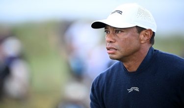 (FILES) US golfer Tiger Woods reacts after driving from the 4th tee during his second round, on day two of the 152nd British Open Golf Championship at Royal Troon on the south west coast of Scotland on July 19, 2024. Golf superstar Tiger Woods was involved in a car crash in Florida on March 27, 2026, US media reports citing local law enforcement said. There was no immediate word on Woods' condition following the incident in Jupiter Island, ABC television reported. NBC local news affiliate WPTV showed a picture of the crash scene showing a sports utility vehicle flipped onto its side. (Photo by ANDY BUCHANAN / AFP) / RESTRICTED TO EDITORIAL USE