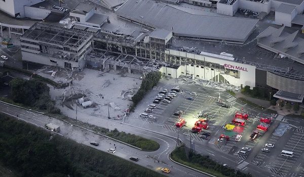 An aerial view shows rescue workers conducting a search and rescue operation at the damaged Aeon Mall shopping centre, where, according to local media, an explosion occurred after an earthquake with a preliminary magnitude of 7.1 struck Japan's southern Kumamoto prefecture, in Kashima Town, Kumamoto Prefecture, Japan, July 28, 2026. Kyodo/via REUTERS ATTENTION EDITORS - THIS IMAGE HAS BEEN SUPPLIED BY A THIRD PARTY. MANDATORY CREDIT. JAPAN OUT. NO COMMERCIAL OR EDITORIAL SALES IN JAPAN.