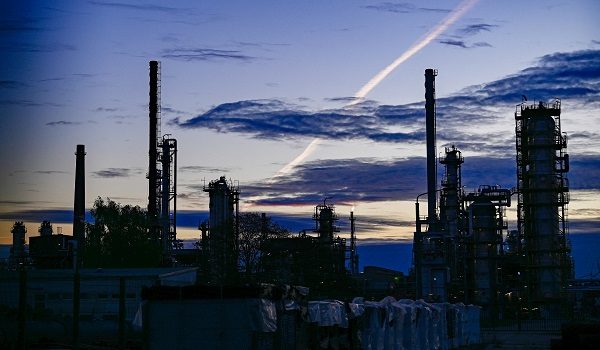 Towers of the facilities of the PCK Schwedt refinery in Schwedt, northeastern Germany, are pictured at the company's plant on early April 30, 2026, one day before Russia will halt the pipeline flow of Kazakh oil to Germany, citing technical reasons. The stoppage from May 1, 2026 will impact the PCK refinery, run by the German subsidiary of Russia's state-owned oil company Rosneft, that supplies much of the Berlin region and the capital's international airport with fuel. The move by Moscow comes amid Russia's war against Ukraine and a global energy crisis sparked by the US-Israeli war against Iran, which has caused major disruptions to global oil and gas markets. The German government stressed it does not expect an energy supply crunch. (Photo by Tobias SCHWARZ / AFP)