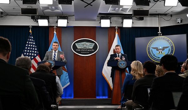 US Defense Secretary Pete Hegseth speaks alongside the Chairman of the Joint Chiefs of Staff General Dan Caine during a press briefing at the Pentagon in Washington, DC, on April 24, 2026. (Photo by ANNABELLE GORDON / AFP)