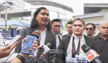 Ratu Naga (kanan) dan peguamnya ditemui wartawan selepas memberi keterangan di Bukit Aman