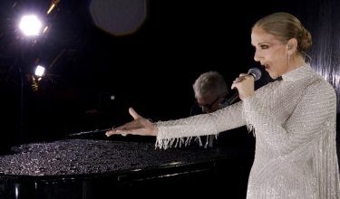(FILES) A grab of a video released by the Olympic Broadcasting Services shows Canadian Singer Celine Dion performing on the Eiffel Tower during the opening ceremony of the Paris 2024 Olympic Games, in Paris, on July 26, 2024. Quebec star Celine Dion officially announced on March 30, 2026, a series of ten concerts in Paris in September and October in Europe's largest indoor venue, near Paris, to mark her 58th birthday, confirming her return to the stage after six years away from the public. (Photo by various sources / AFP) / RESTRICTED TO EDITORIAL USE - MANDATORY CREDIT "POOL / OLYMPIC BROADCASTING SERVICES " - NO MARKETING NO ADVERTISING CAMPAIGNS - DISTRIBUTED AS A SERVICE TO CLIENTS