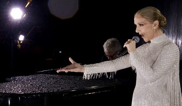 (FILES) A grab of a video released by the Olympic Broadcasting Services shows Canadian Singer Celine Dion performing on the Eiffel Tower during the opening ceremony of the Paris 2024 Olympic Games, in Paris, on July 26, 2024. Quebec star Celine Dion officially announced on March 30, 2026, a series of ten concerts in Paris in September and October in Europe's largest indoor venue, near Paris, to mark her 58th birthday, confirming her return to the stage after six years away from the public. (Photo by various sources / AFP) / RESTRICTED TO EDITORIAL USE - MANDATORY CREDIT "POOL / OLYMPIC BROADCASTING SERVICES " - NO MARKETING NO ADVERTISING CAMPAIGNS - DISTRIBUTED AS A SERVICE TO CLIENTS