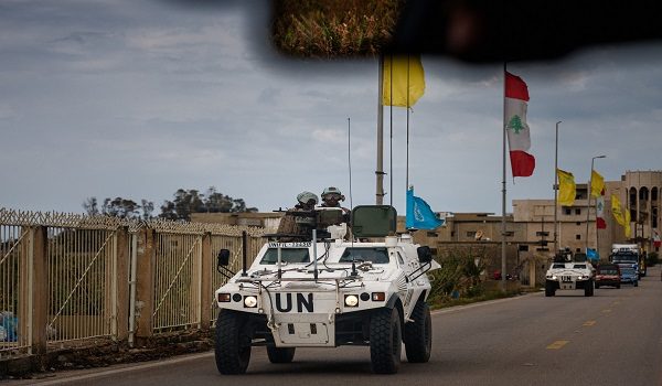 A United Nations Interim Force in Lebanon (UNIFIL) convoy drives near the southern Lebanese city of Tyre on March 23, 2026. The Israeli military said it launched a wave of strikes on Beirut targeting the Iran-backed militant group Hezbollah, after urging residents of several areas to evacuate. Lebanon was pulled into the Middle East war when Hezbollah began firing rockets into Israel on March 2 to avenge the killing of Iran's supreme leader Ayatollah Ali Khamenei in US-Israeli strikes. Lebanon's health ministry says the latest war has killed more than 1,000 people in Lebanon and displaced more than one million more. (Photo by Dimitar DILKOFF / AFP)