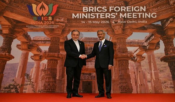 India's Foreign Minister Subrahmanyam Jaishankar (R) welcomes his Iran's counterpart Abbas Araghchi for the opening of the BRICS Foreign Ministers Meeting at the Bharat Mandapam in New Delhi on May 14, 2026. (Photo by Arun SANKAR / AFP)