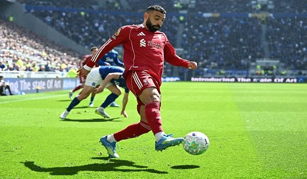Liverpool's Egyptian striker #11 Mohamed Salah controls the ball during the English Premier League football match between Everton and Liverpool at Hill Dickinson Stadium in Liverpool, north west England on April 19, 2026. (Photo by Paul ELLIS / AFP) / RESTRICTED TO EDITORIAL USE. No use with unauthorized audio, video, data, fixture lists, club/league logos or 'live' services. Online in-match use limited to 120 images. An additional 40 images may be used in extra time. No video emulation. Social media in-match use limited to 120 images. An additional 40 images may be used in extra time. No use in betting publications, games or single club/league/player publications. /