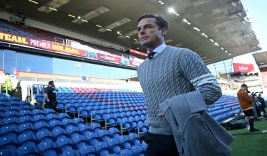 (FILES) Burnley's English manager Scott Parker arrives before the English Premier League football match between Burnley and Manchester City at Turf Moor in Burnley, north-west England on April 22, 2026. Scott Parker has left his position as head coach of Burnley following the club's relegation from the Premier League, it was announced on April 30, 2026. (Photo by Paul ELLIS / AFP) / RESTRICTED TO EDITORIAL USE. No use with unauthorized audio, video, data, fixture lists, club/league logos or 'live' services. Online in-match use limited to 120 images. An additional 40 images may be used in extra time. No video emulation. Social media in-match use limited to 120 images. An additional 40 images may be used in extra time. No use in betting publications, games or single club/league/player publications. /